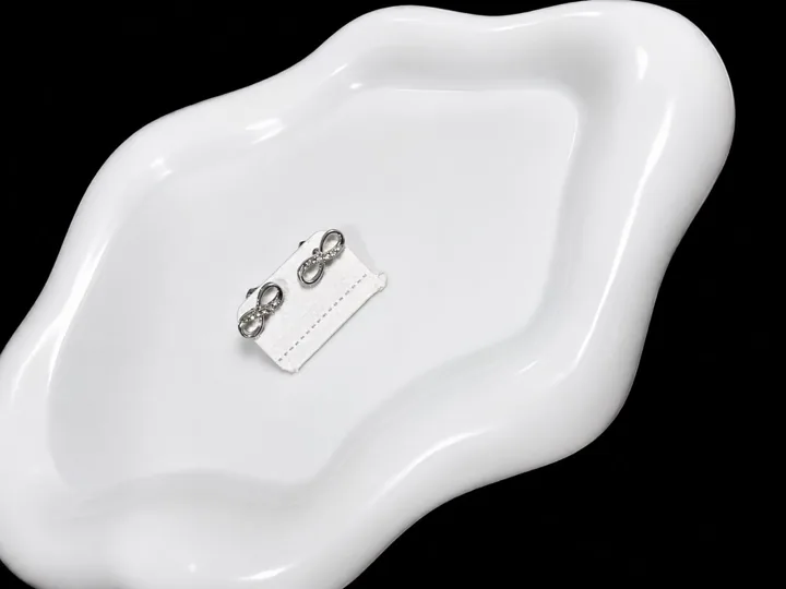 Infinity Bow Studs